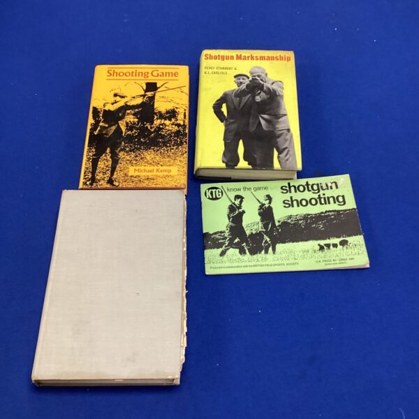 Vintage lot of three shooting books on shotgun shooting and marksman techniques.