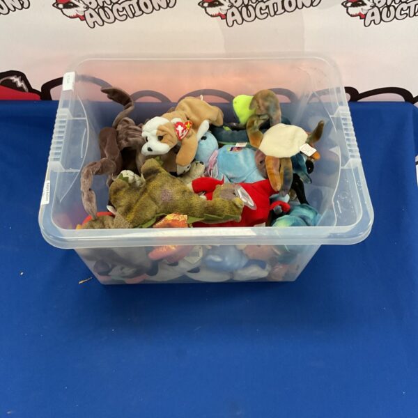Vintage Ty Beanie Babies lot with tags, collectible plush toys.