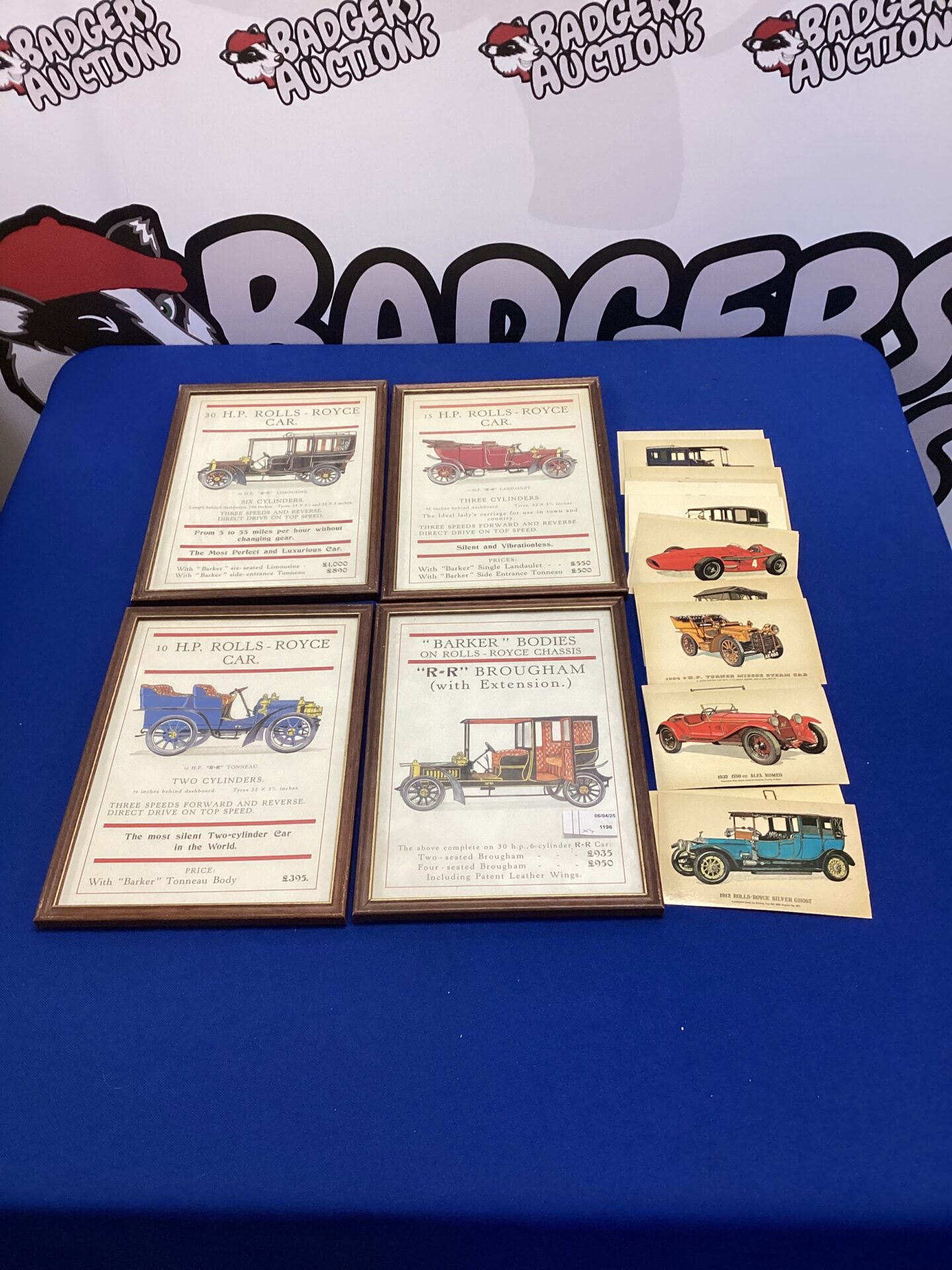 528 Four framed rolls-royce advertisements & Quantity of automotive postcards