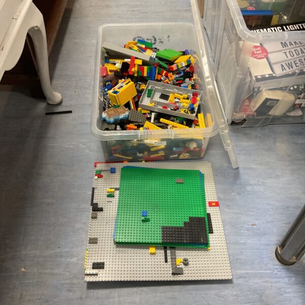 Large mixed Lego lot with colourful bricks and baseplates.
