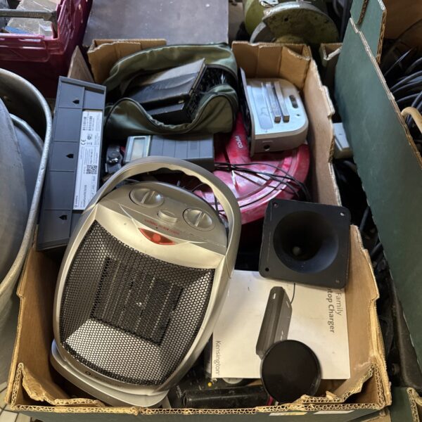 Front view of a Neostar electric heater, part of a house clearance.