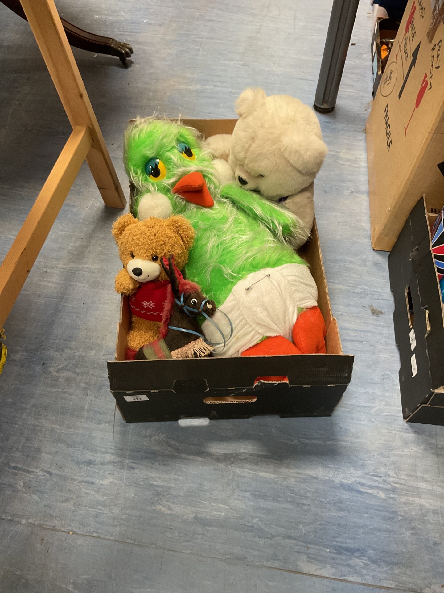 422 Crate of mixed teddies and soft toys inc large orville the duck soft toy