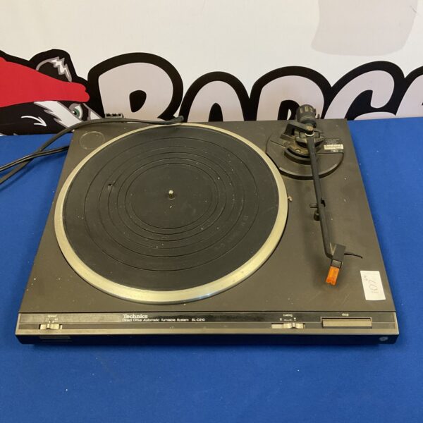Vintage Technics SL-D210 direct drive turntable for vinyl records.