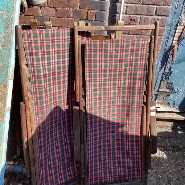 Pair of vintage deck chairs with checked canvas.