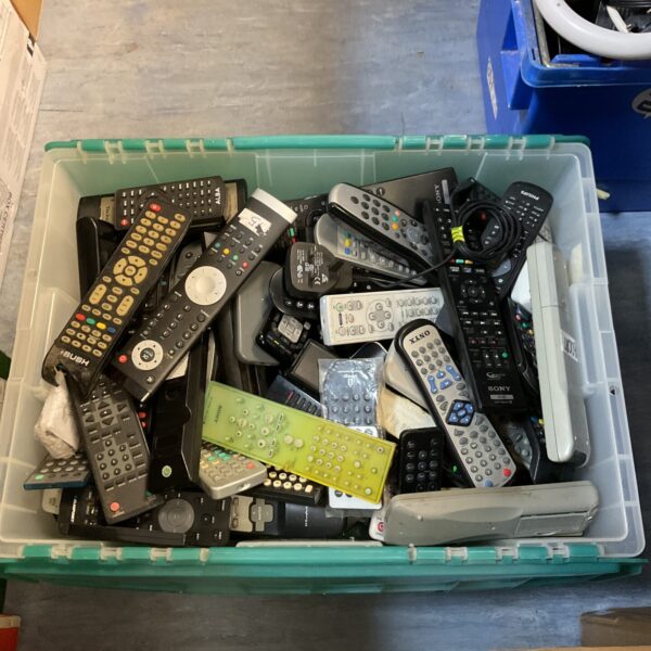 Large lot of assorted remote controls from various brands.