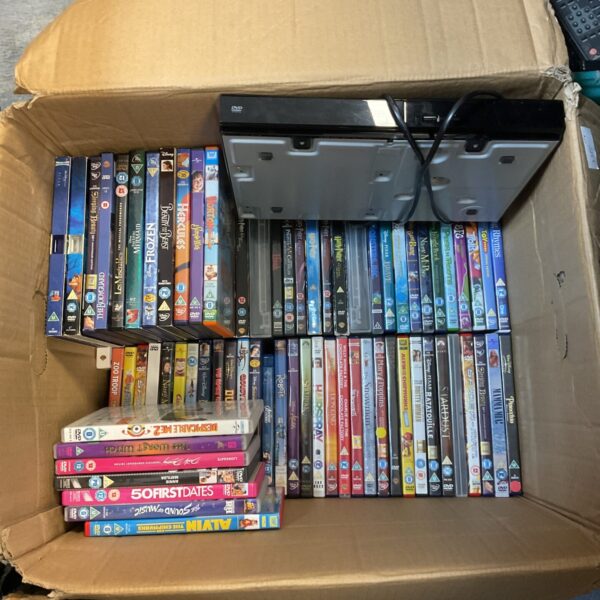 Large lot of children’s DVDs with portable DVD player for family entertainment.