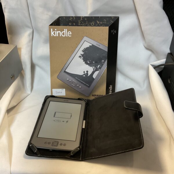Amazon Kindle ereader with protective case, showing signs of wear.