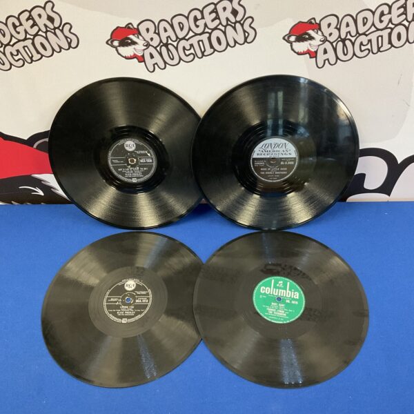 Vintage lot of Elvis Presley 78rpm records for collectors.