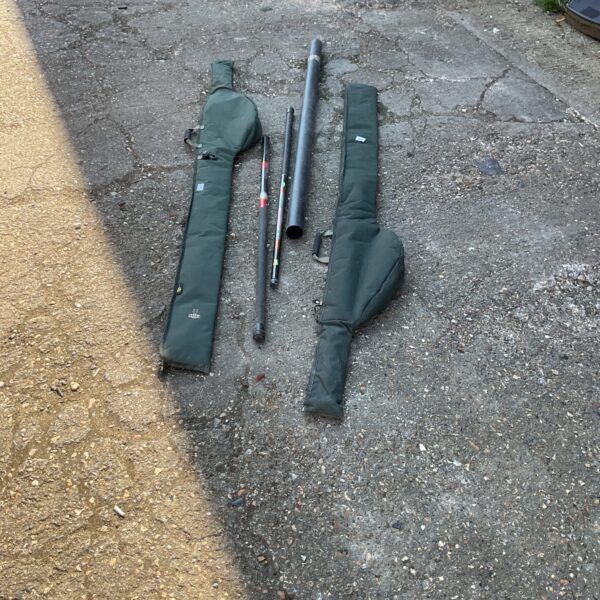 Two Eurocor 6ft fishing poles in protective bags.