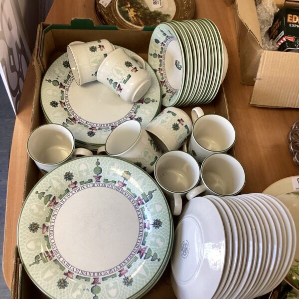 Vintage Staffordshire Pottery topiary dinner service set on display.
