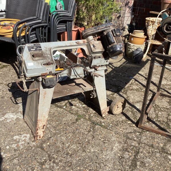 Portable Sealey band saw for metal cutting in a workshop setting.