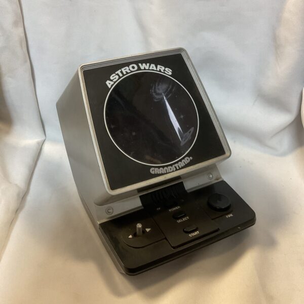 Vintage Grandstand Astro Wars tabletop LCD game, side view.