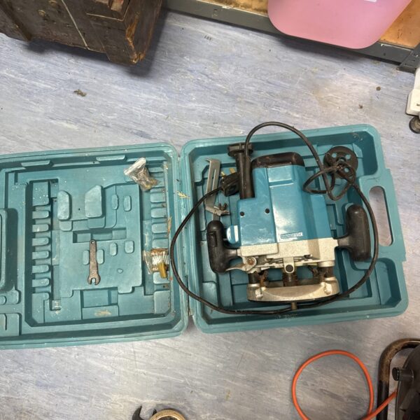 Vintage Black and Decker PC-GF15 router in carrying case.