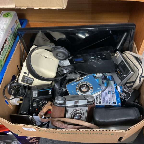 Vintage Sony Walkman cassette player in used condition.