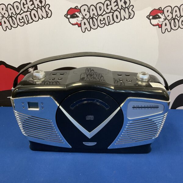 Vintage Bergstrom portable CD radio with AM/FM functionality.