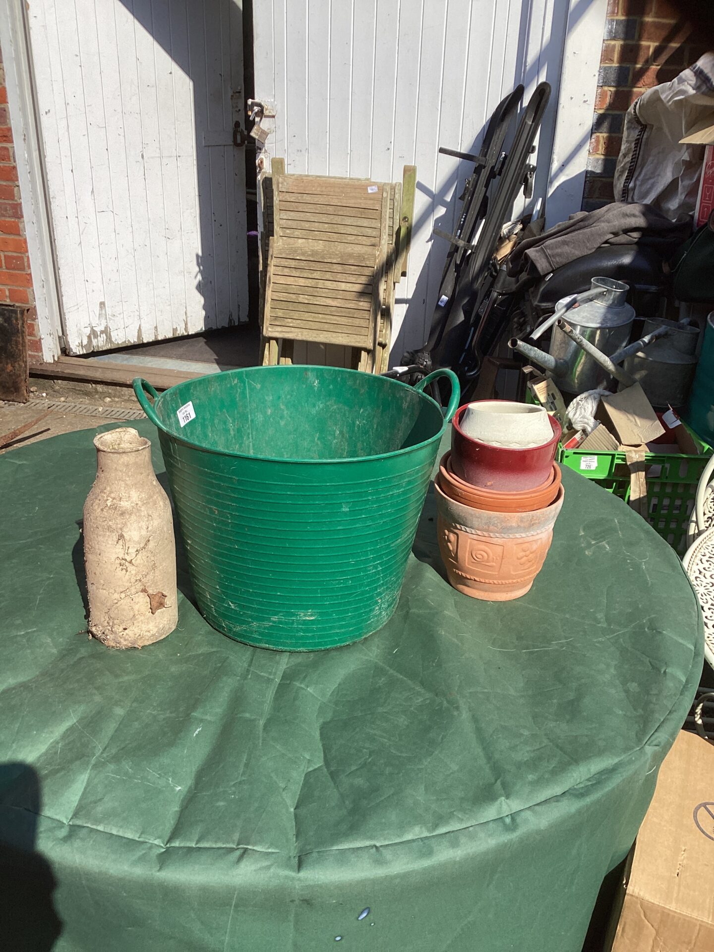 1161 Garden planters and weed bucket