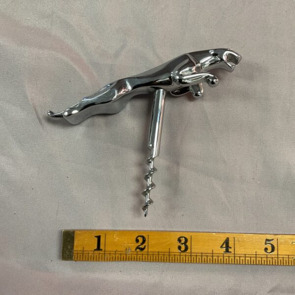 Vintage Jaguar leaping jaguar corkscrew, a collectible bar accessory.