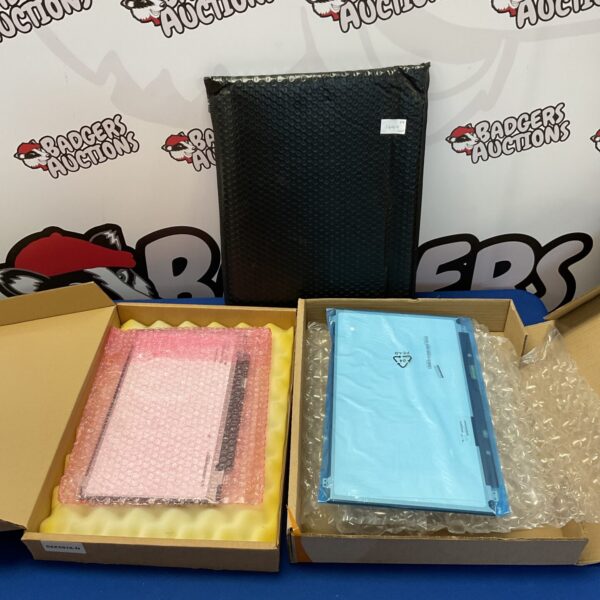 Lot of three new laptop screens in protective packaging.