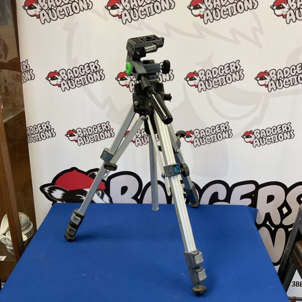 Vintage Slik 88 camera tripod for photography equipment.