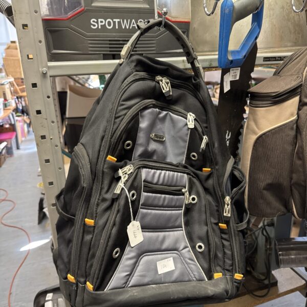 Black Targus rucksack with multiple compartments and padded straps.