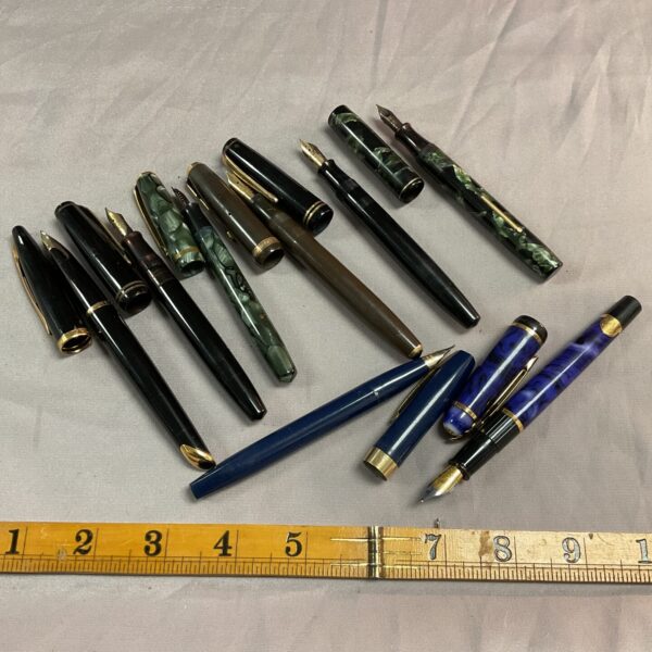 Lot of eight vintage fountain pens, including Burnham and Waterman.