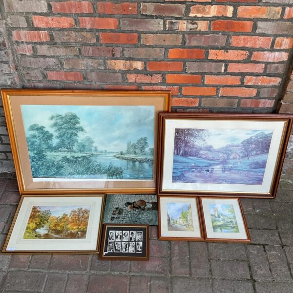 Framed watercolour print of a serene country landscape with a river.