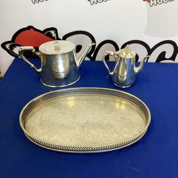 Vintage silverplate coffee set with tray and water jug.