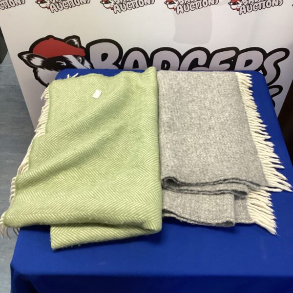 Two vintage wool blankets with a woven pattern, ideal for home decor.