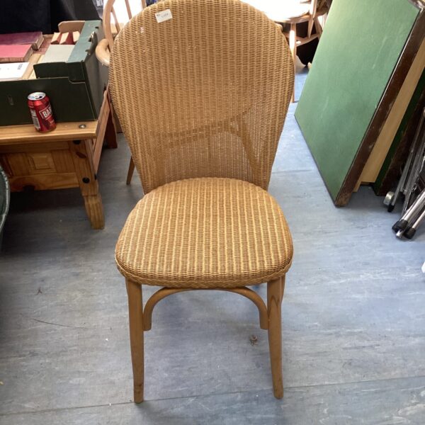 Vintage Lloyd Loom chair with woven paper seat and back.