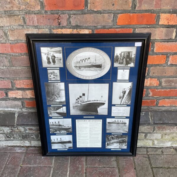 Framed Titanic history print with vintage nautical details.