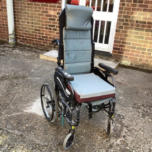 Front view of a Karma high-back wheelchair, showing its features.