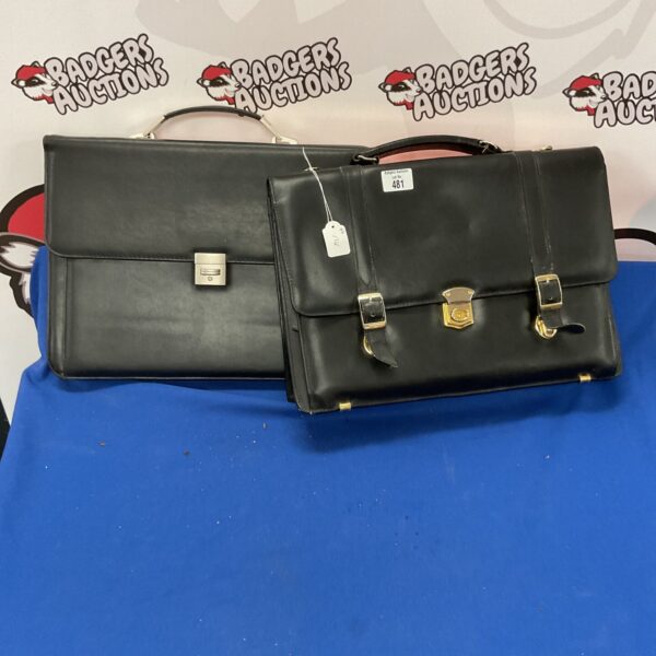 Vintage brown leather briefcase with clasp closure.