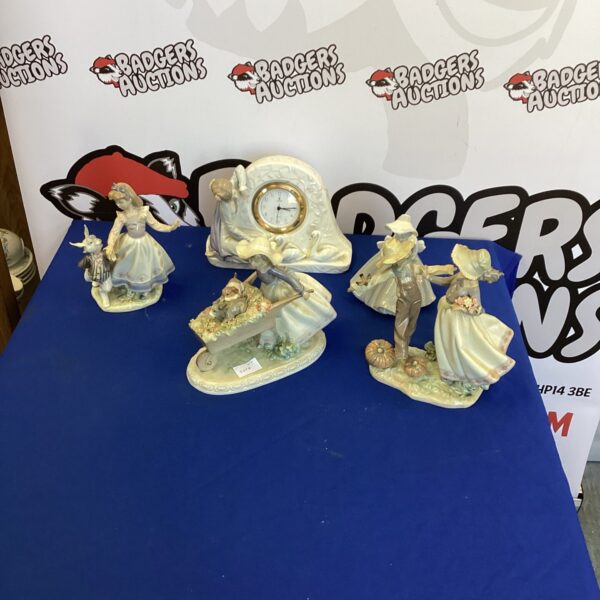 Selection of delicate Lladro porcelain figurines on display.