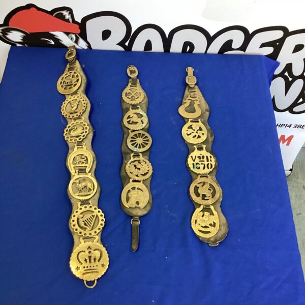Antique horse brasses, a collection of vintage equestrian ornaments.