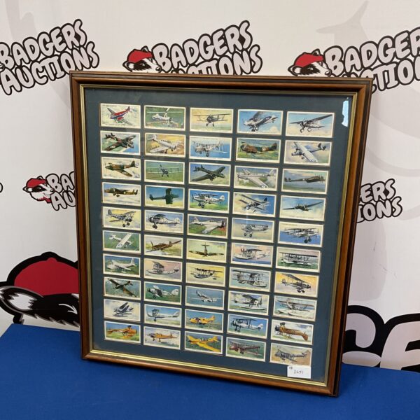 Framed set of vintage John Players aviation cigarette cards.