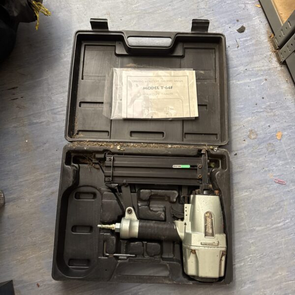 Vintage heavy duty T-nailer, model T-64f, pneumatic tool for woodworking.