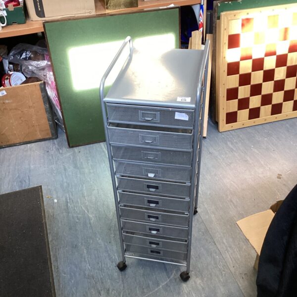 Metal ten-drawer storage unit on wheels for portable office or home use.
