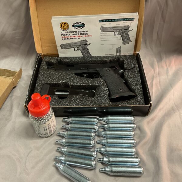 ALI Co2 Blowback .177 BB pistol with gas cylinders and BBs.
