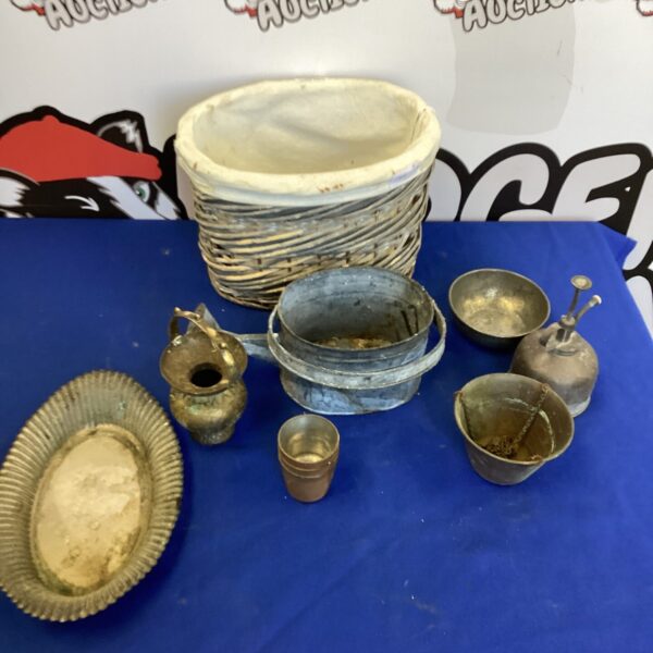 Selection of vintage metal plant pots for garden or indoor use.