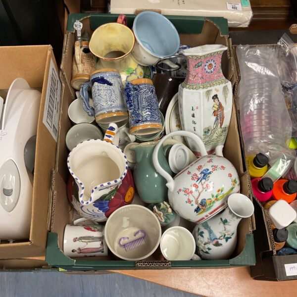 Mixed lot of vintage china and pottery with colourful patterns.