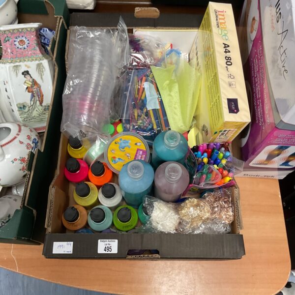 Mixed arts and crafts lot with paints, pens and paper.