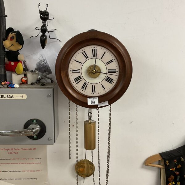 Antique German post office wall clock with weights and pendulum.