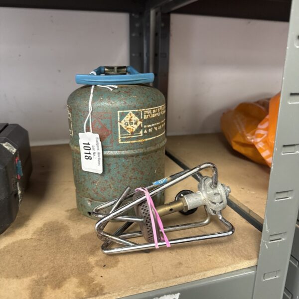 Vintage blue Camping Gaz stove for outdoor cooking.