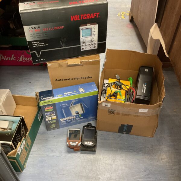 Mixed electrical lot with vintage and modern devices.