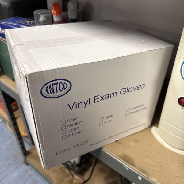 Sealed box of Intco size L vinyl exam gloves for medical use.