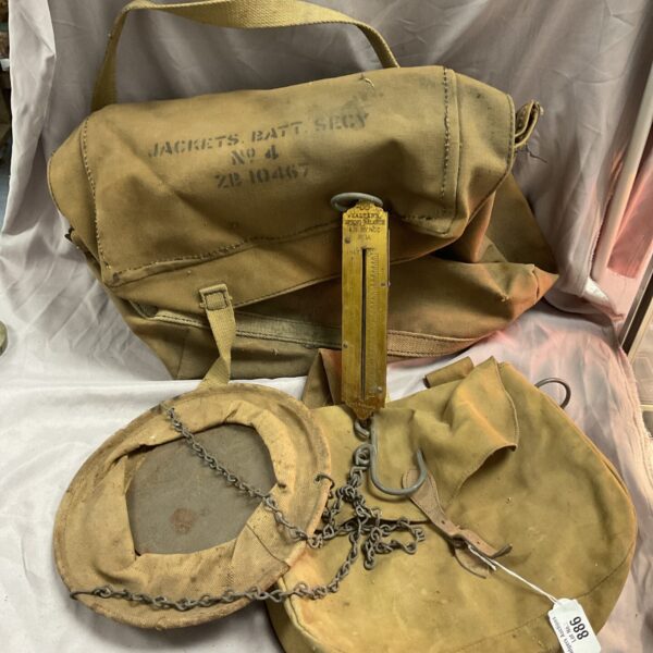Vintage 1943 military scales with canvas bucket and kitbags.