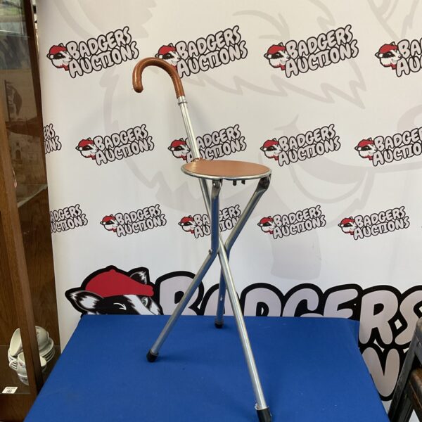 Silver Tirion tripod shooting stick for hunting and outdoor use.