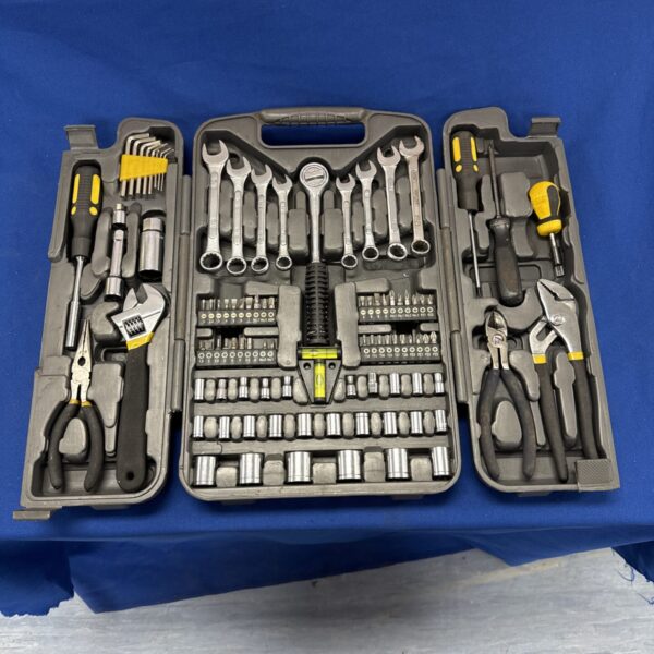 Used tool set with wrenches and sockets in a plastic case.