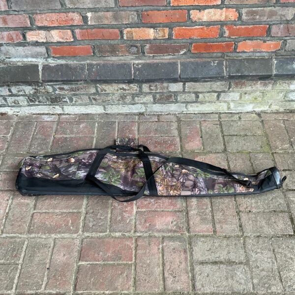 Camouflaged Buffalo rifle case for secure firearm transport.