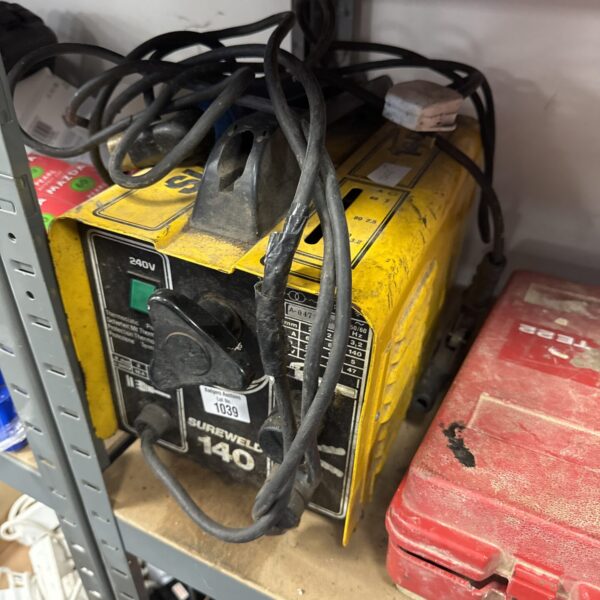 Vintage Sureweld 140 portable arc welder in used condition.